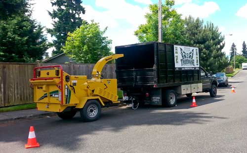 A picture of a truck transporting wood chips